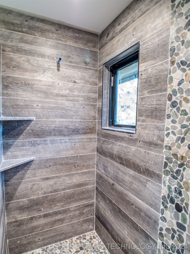 bathroom with walk in shower