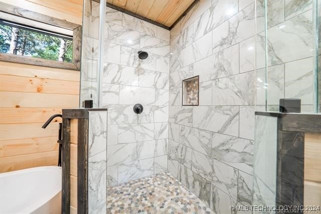 bathroom featuring wood ceiling and independent shower and bath