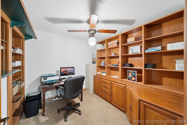 office area with ceiling fan and light colored carpet