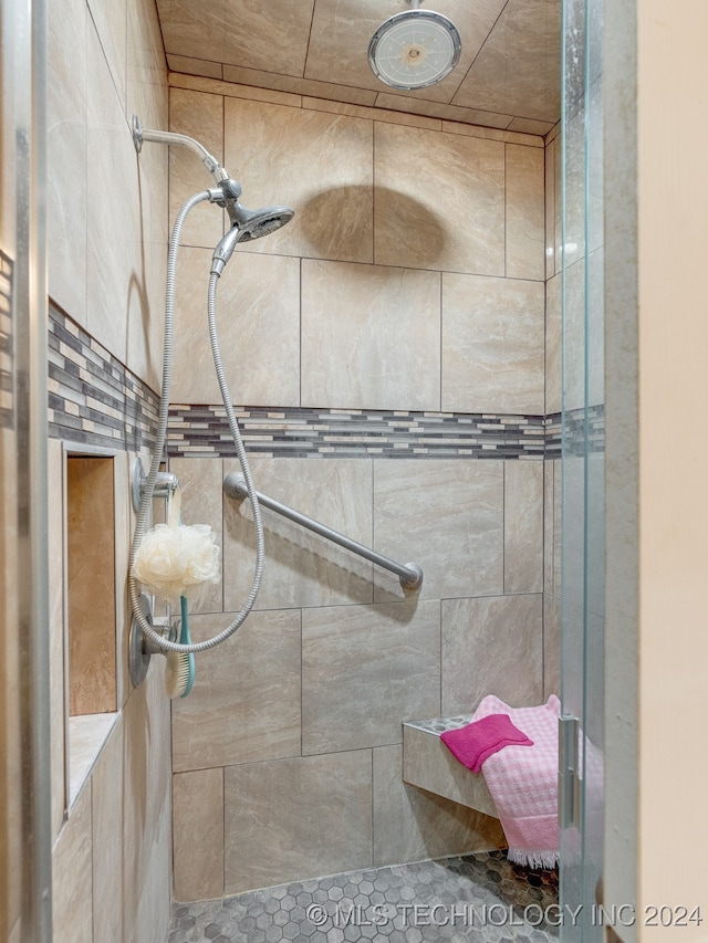 bathroom featuring an enclosed shower