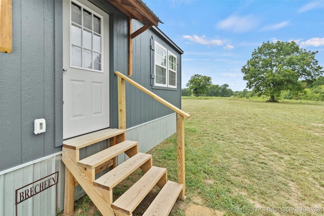 exterior space featuring a lawn