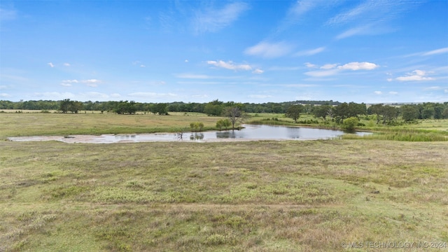 view of yard with a water view