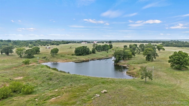 aerial view with a rural view and a water view