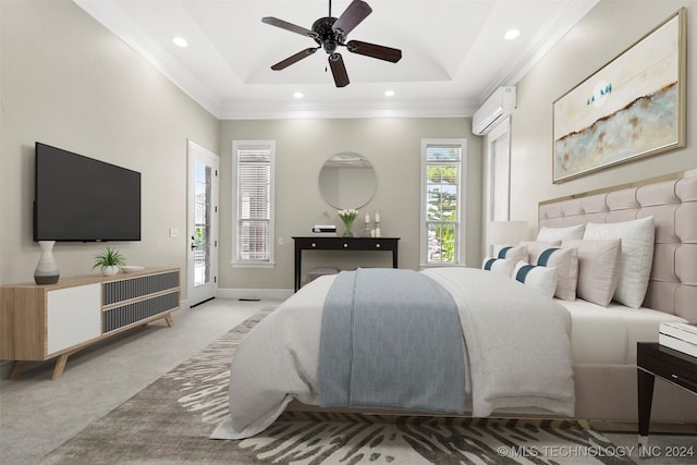 bedroom with a tray ceiling, ceiling fan, light colored carpet, and a wall mounted air conditioner