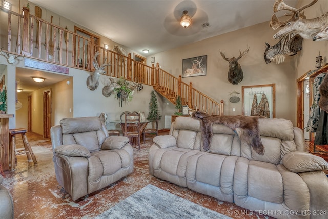 living room with ceiling fan