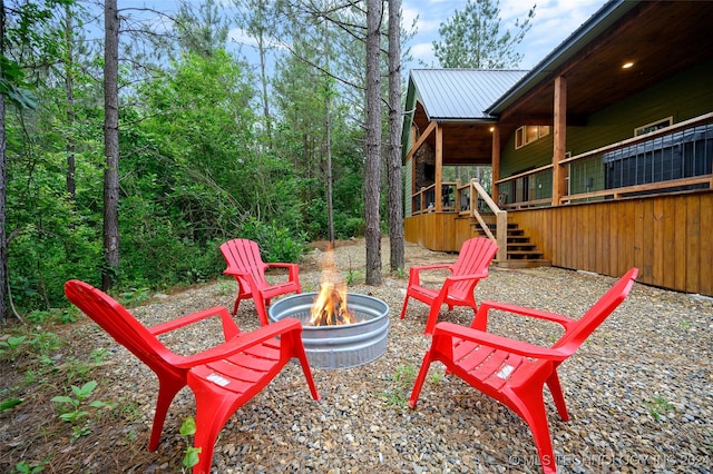 view of patio / terrace with a fire pit