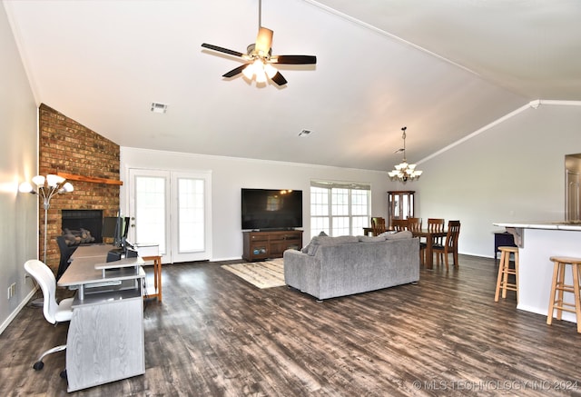 living room with dark wood-type flooring, lofted ceiling, and a fireplace