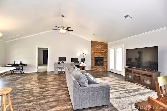 living room featuring a fireplace, ornamental molding, dark hardwood / wood-style flooring, and vaulted ceiling