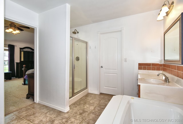 bathroom with vanity, tile patterned floors, plus walk in shower, and ceiling fan