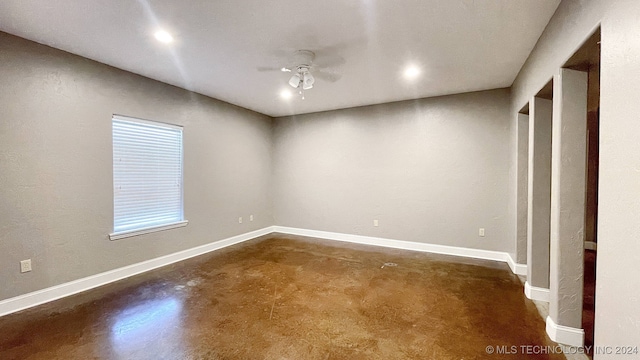 spare room featuring ceiling fan