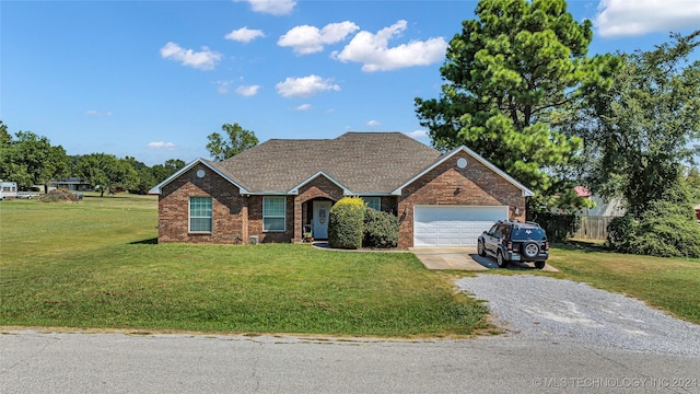 150 Whipperwill, Lone Grove, OK 73401 - view of front of home featuring a garage, gravel driveway, brick siding, and a front yard