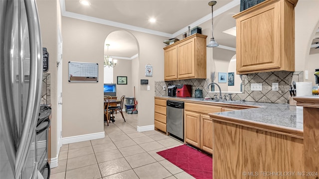 kitchen with light tile patterned flooring, crown molding, tasteful backsplash, appliances with stainless steel finishes, and sink