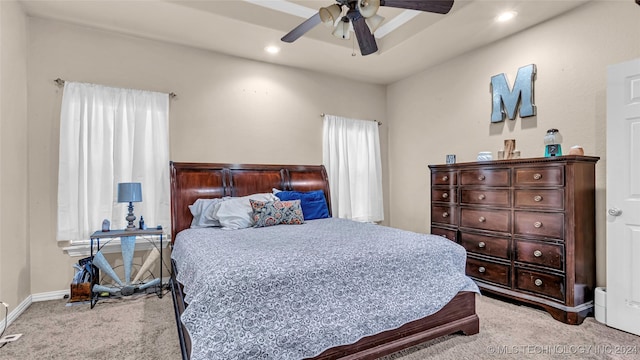 150 Whipperwill, Lone Grove, OK 73401 - bedroom featuring baseboards, light carpet, recessed lighting, a tray ceiling, and ceiling fan