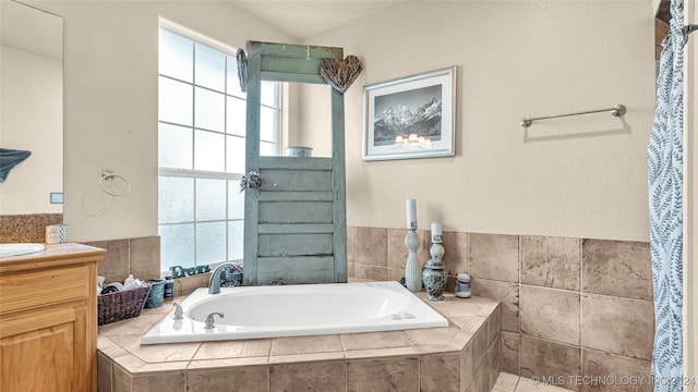 150 Whipperwill, Lone Grove, OK 73401 - bathroom with a garden tub and vanity