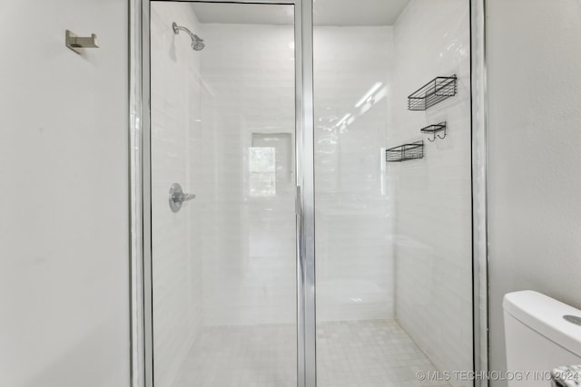 3408 Redbud Ln, Tulsa, OK 74132 - bathroom featuring a shower stall and toilet