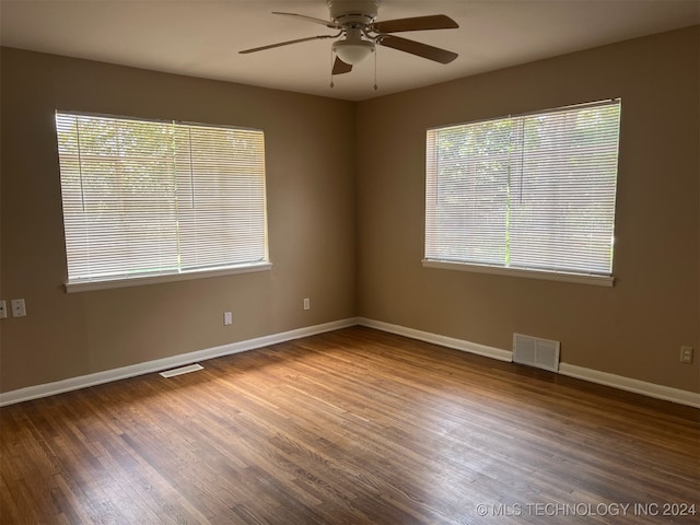 spare room featuring ceiling fan and hardwood / wood-style flooring