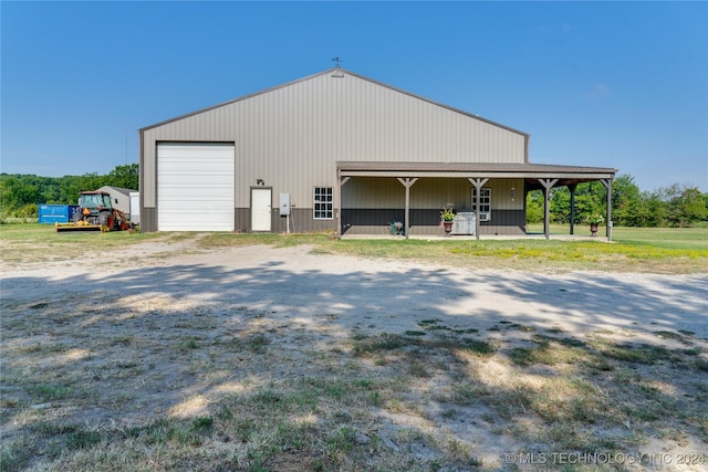 view of outbuilding with a garage