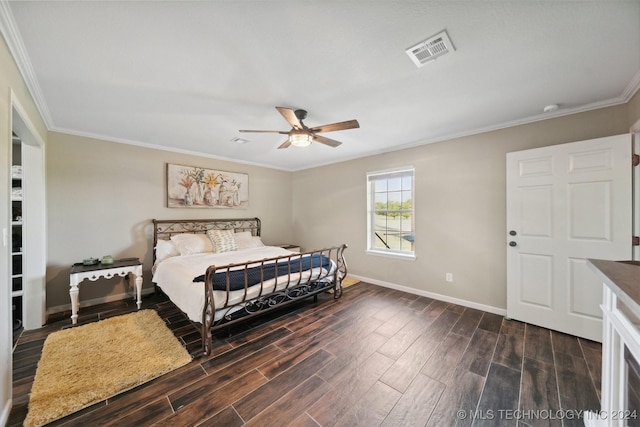 bedroom featuring ceiling fan, crown molding, and dark hardwood / wood-style floors