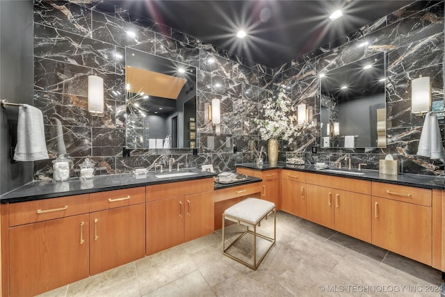 full bathroom featuring backsplash and vanity