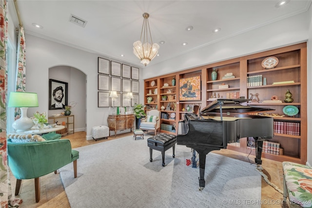 living area with arched walkways, recessed lighting, visible vents, ornamental molding, and an inviting chandelier