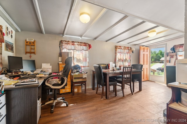 office with beamed ceiling and light wood-type flooring