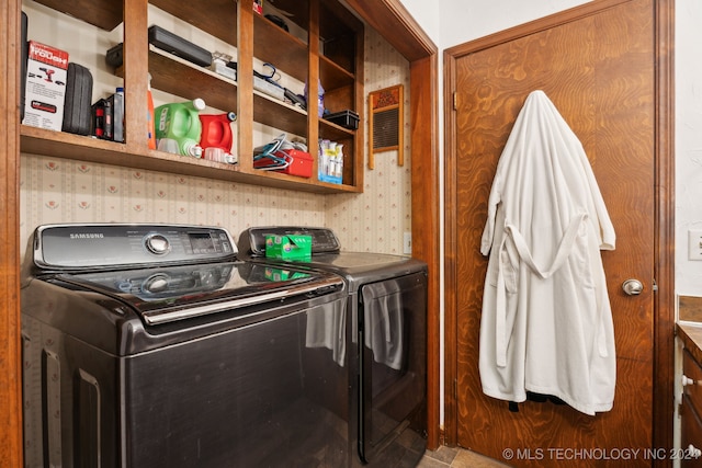 laundry area with independent washer and dryer