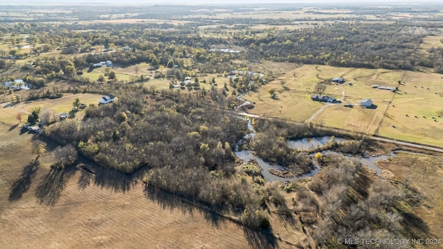 aerial view with a rural view and a water view