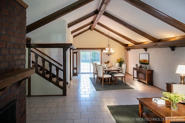 dining room featuring tile patterned flooring, vaulted ceiling with beams, a brick fireplace, and a notable chandelier