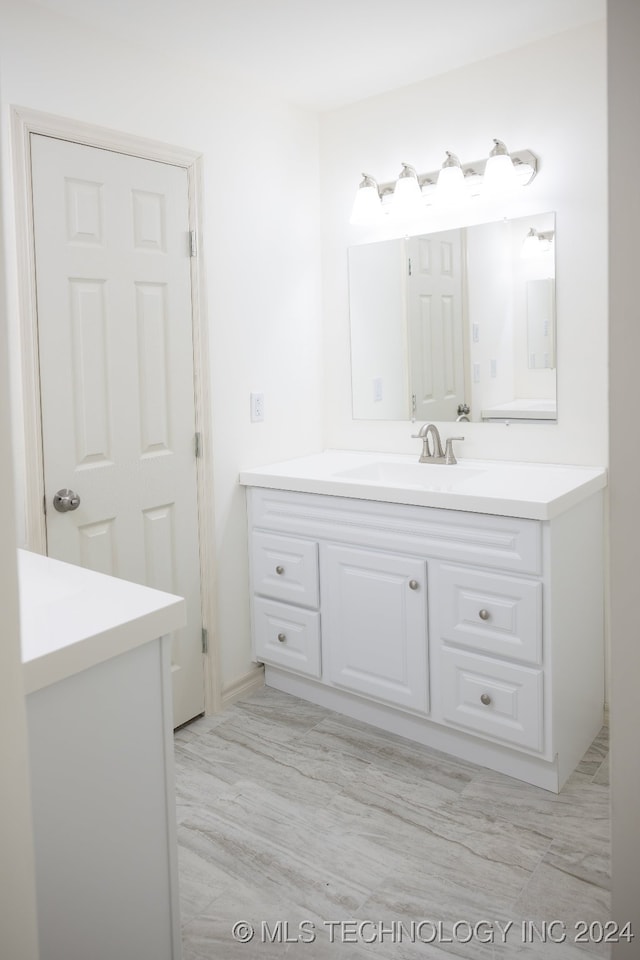 bathroom featuring vanity