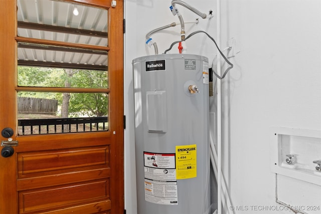 utility room with water heater