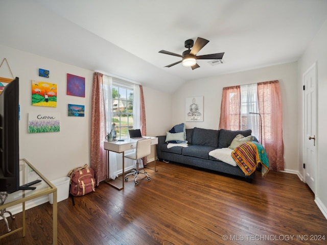 living area with dark wood-style floors, lofted ceiling, visible vents, ceiling fan, and baseboards