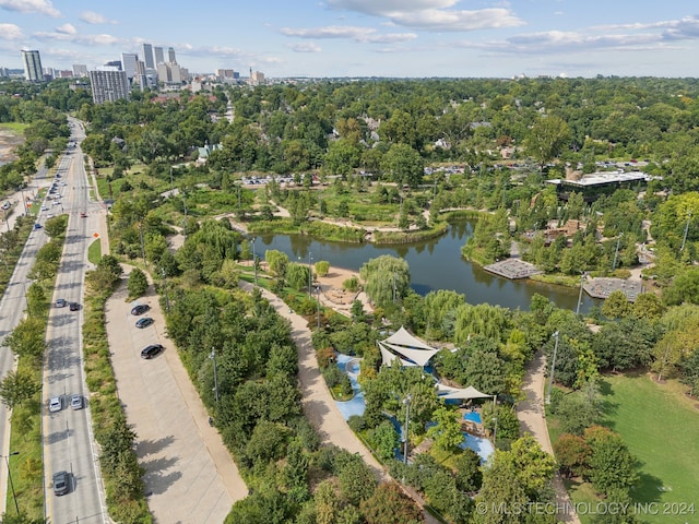 bird's eye view featuring a water view and a view of city