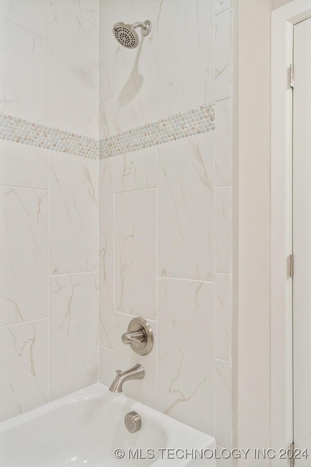 full bath featuring shower / bathing tub combination