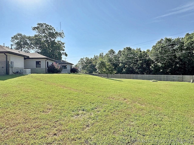 view of yard featuring central AC unit