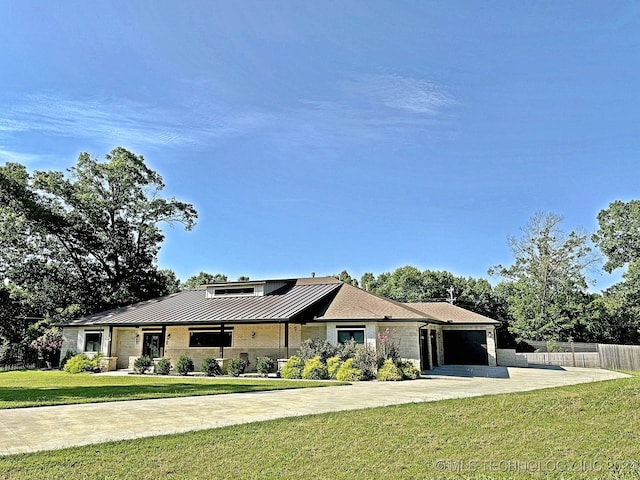 view of front of property with a front lawn