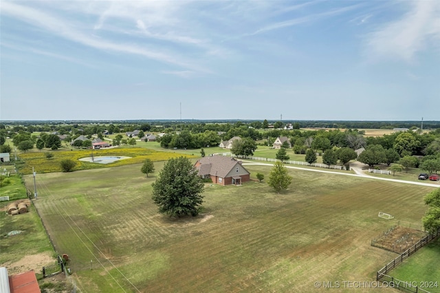 birds eye view of property featuring a rural view