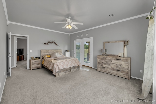 bedroom featuring ceiling fan, crown molding, and light colored carpet