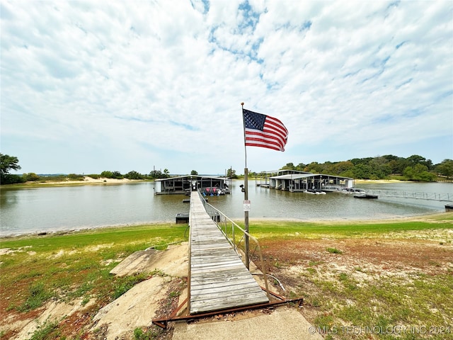 dock area with a water view