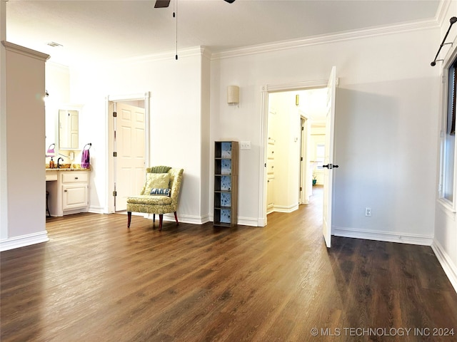 living area featuring ceiling fan, ornamental molding, and dark hardwood / wood-style flooring