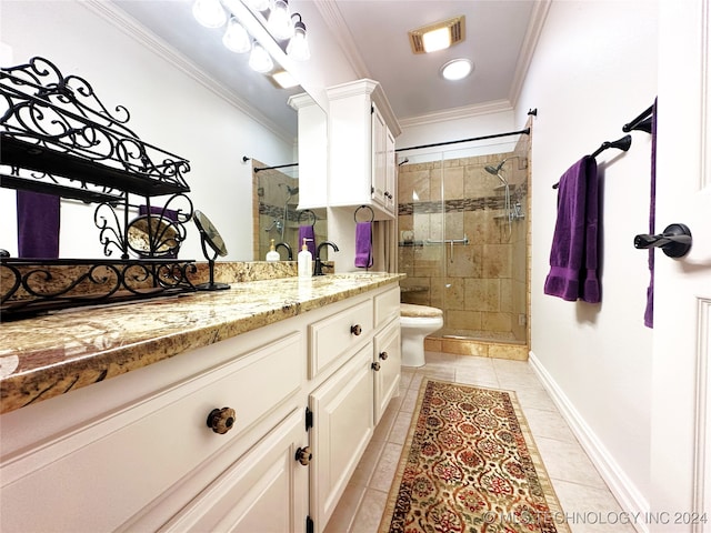 bathroom with crown molding, vanity, a shower with shower door, and tile patterned flooring