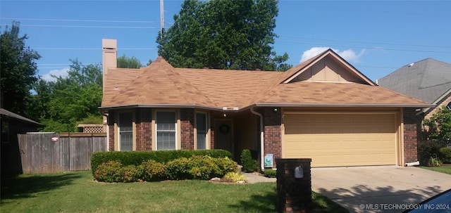 ranch-style house with a front yard and a garage