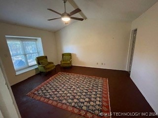 unfurnished room with ceiling fan and lofted ceiling