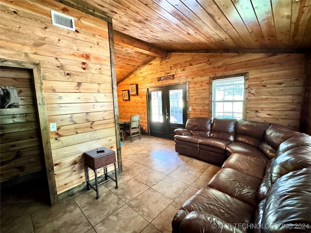 unfurnished living room featuring light tile patterned floors, french doors, lofted ceiling with beams, and wood ceiling