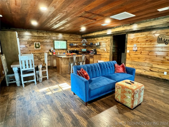 living room featuring wooden ceiling, wood walls, and dark wood-type flooring