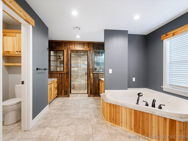 bathroom featuring ornamental molding, vanity, ceiling fan, hardwood / wood-style floors, and toilet