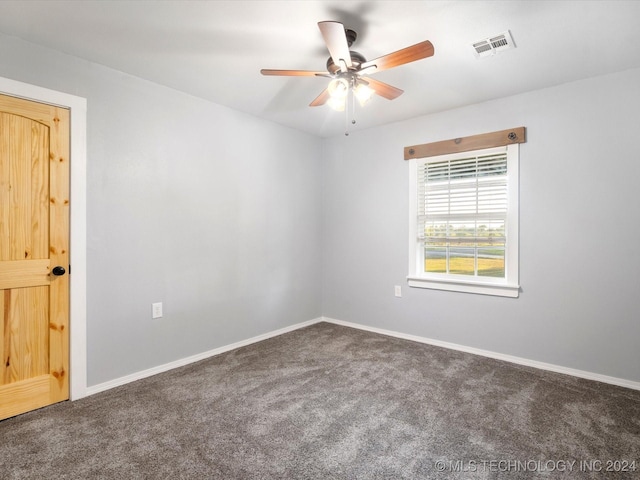 carpeted empty room with ceiling fan