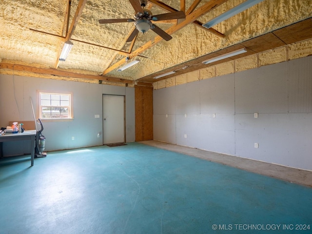 interior space with ceiling fan