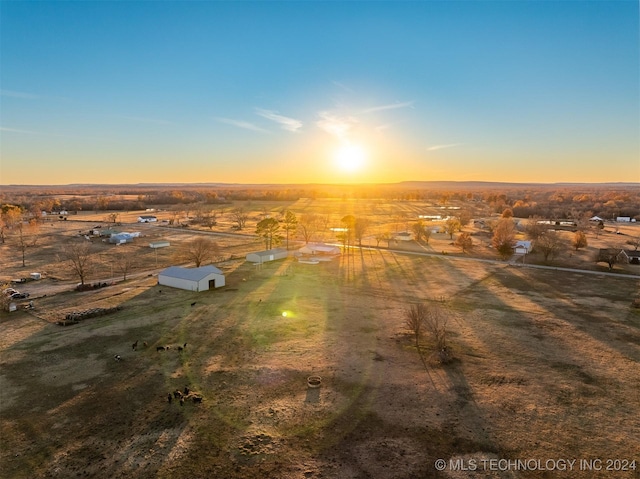 aerial view at dusk with a rural view