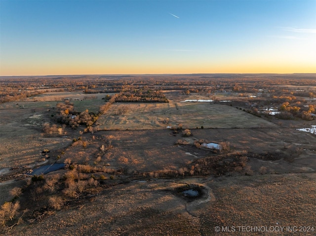 view of aerial view at dusk