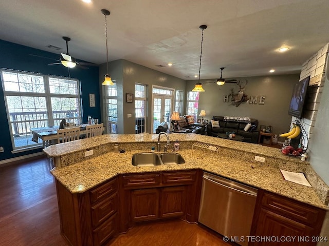 kitchen featuring ceiling fan, dishwasher, sink, and dark hardwood / wood-style floors